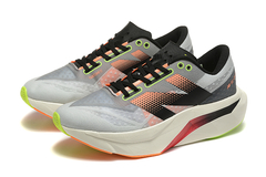 TÊNIS NEW BALANCE FUELCELL REBEL V4 "CINZA LARANJA NEON" (PRAZO DE ATÉ 20 DIAS PARA ENTREGA) - FRETE GRÁTIS BR na internet