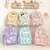 Mochila de grande capacidade para crianças, bolsa de escola Sanrio elegante, mi