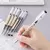 12 unidades/lote Japão Fine Point Pen 0.35mm Preto Azul Vermelho Tinta Gel Cane - loja online