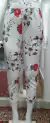 CALÇA CHARRY COLLECTION BRANCA COM FLORES na internet