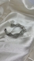 Bracelete prata torcido na internet