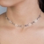 Choker de aço inox, estrelas e zircônia