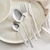 SET DE CUBIERTOS DE 16 PIEZAS LINEA BEAN PLATEADO BRILLOSO - comprar online