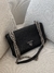 BOLSA PRADA EM COURO SAFFIANO E NYLON PRETO na internet