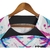 Image of Camisa Treino Barcelona 23/24 - Torcedor Nike Masculina - Branca com detalhes em rosa e azul e verde