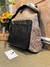 Mochila coach cafe negro - Moda AR