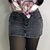 Saia Jeans Preta Lavagem Estonada - comprar online