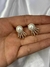 Brincos spikes e pérola na internet