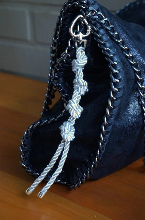 Llavero cordón plata