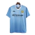 Camisa retrô do Manchester City 2011/2012 na cor azul, com escudo e logo da Umbro.