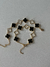 Pulseira trevo cravejada & lisa ‘ preta dourada - comprar online