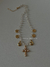 Colar Charms Cruz perolada dourado na internet