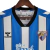 Camisa Málaga I 22/23 - Torcedor Hummel Masculina - Azul com detalhes em branco e preto na internet