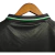 Camisa Retrô Manchester United 1998 - Masculina Umbro - Preta com detalhes em verde