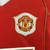 Kit Infantil Manchester United I 06/07 na internet
