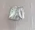 Short Cuero Plateado en internet