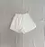 Short Cuero Blanco en internet