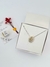 Colar inicial cravejada com zircônias ródio