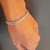 PULSEIRA LACRAIA PRATEADA RÓDIO