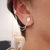 BRINCO OVAL ZIRCÔNICAS CORRENTE PIERCING FAKE EM PRATA