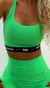 Conjunto deportivo verde lima con top y biker para gimnasio.