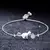 Pulseira Feminina com Zircônia Cúbica e Cristal Bola de Gato - loja online