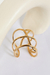 BRACELETE ENTRELAÇADA DOURADO
