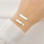 Pulseira Plaquinha Lisa com Coração de Prata - Serena