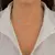 Choker 5 Olhos Gregos Branco de Prata mista na internet