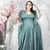 Vestido Verde Oliva Plus Size Longo Manga Capa Fenda Lurex Madrinhas - comprar online