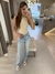 Imagem do CALÇA JEANS RETA CINTURA ALTA APLICAÇÕES