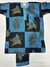 Buba y Shokoto con detalle de mariposa y capullos azules con amarillo con fondo azul munsell y marino - comprar en línea