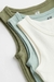 Trío de musculosas H&M en internet