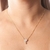 Colar com Pingente de Coração e Menino Cravejado de Zircônias Banhado em Ouro 18k - comprar online