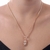 Colar com Pingente de Menina Cravejado de Zircônias Banhado em Ouro 18k - comprar online