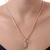 Colar com Pingente de Menino Cravejado de Zircônias Banhado em Ouro 18k - comprar online