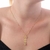 Colar com Pingente Mãe de Pet com Patinha Banhado em Ouro 18k - comprar online