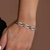 Pulseira Elos com Zircônias Banhado em Ródio Branco