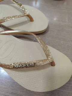 Havaianas Feminina Slim Glitter Dourado Logo Metalico Coleção 2027 - Original na internet