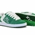 Imagem de um par de tênis Qix Chorão Lado B nas cores verde e branco, com detalhes em suede e cadarços brancos e verdes
