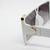 Imagen de Anteojos Sol Grandes Carey Placa Entera Negro Marron