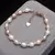 Bracelete Elegante de Pérolas de Água Doce com Pingente em Formato de Coração T- 20 cm x 0,6 mm