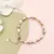 Bracelete Elegante de Pérolas de Água Doce com Pingente em Formato de Coração T- 20 cm x 0,6 mm - Ouver Shop