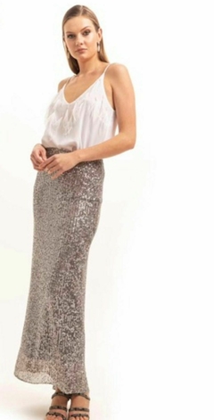 Saia longa de paetê, Ton Âge