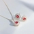 CONJUNTO FLOR CRAVEJADO COM ZIRCÔNIA ROSA - comprar online
