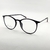 U R35 – Armação Unissex Preta com Detalhe Vermelho para Lentes de Grau em Nylon NT 8114 - Ótica Great Vision