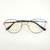 F G42 - Armação Feminina para Lentes de Grau em Metal Dourado com Frente Preta NT8037 na internet