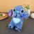 Pelúcia Stitch com iluminação, uma versão fofa e brilhante do personagem, ideal para presentear e decorar ambientes com um toque mágico.