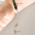 Pulseira bebê chapinha e pedrinhas - ouro 18K - comprar online