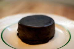 Alfajor de chocolate  relleno de dulce de leche sin tacc